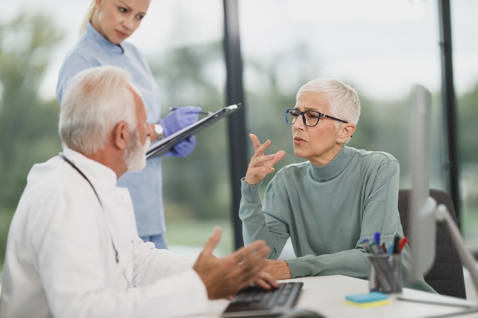 Doctor talking with a patient in a clinic