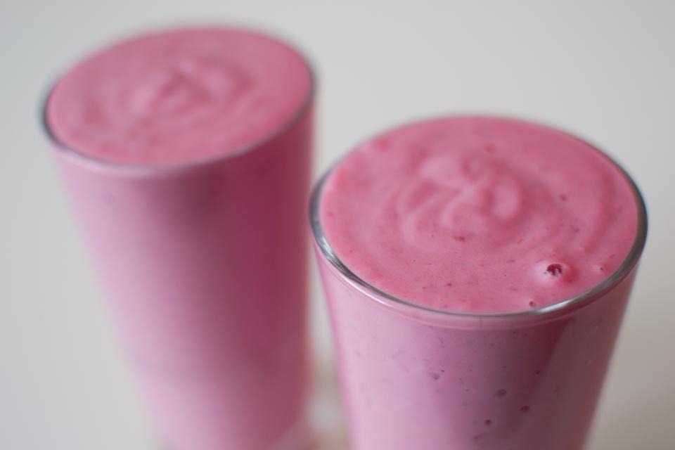 Two pink fruit smoothies