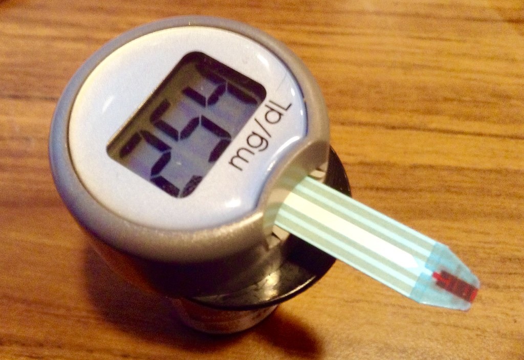 Blood glucose meter showing a high reading