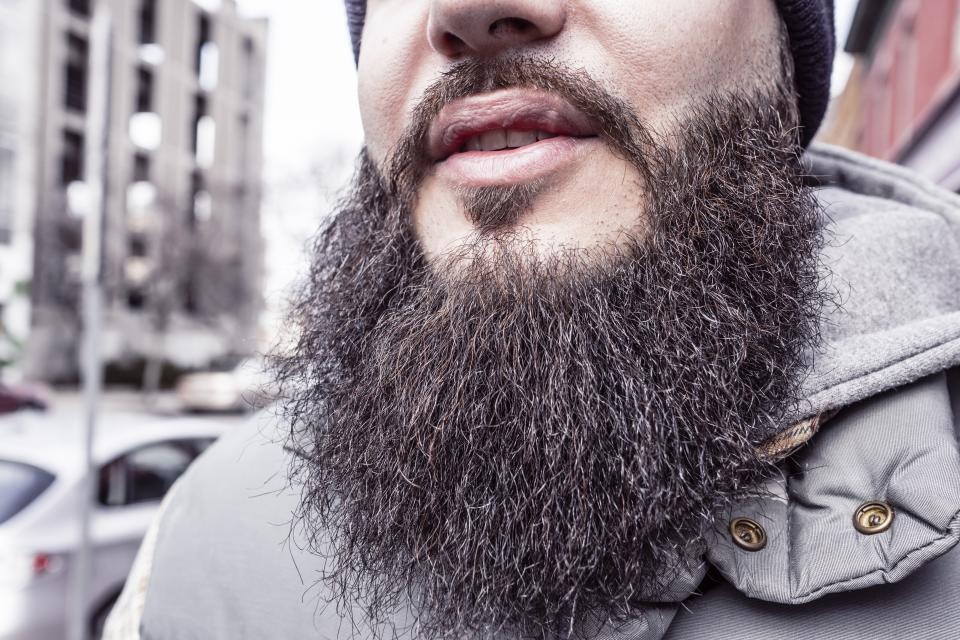 Man with a full beard and thick hair
